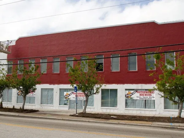 2012: Exterior Transformation Red facade getting its first Motorworks touches.